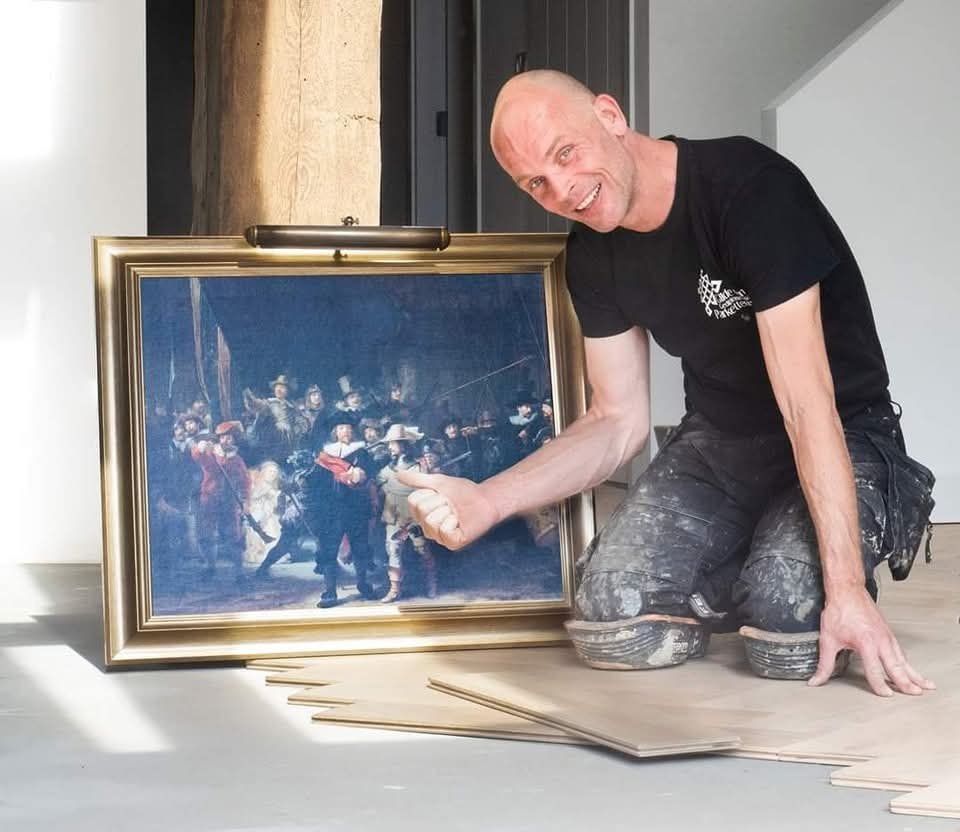 Jakko Woudenberg at work, laying The Night Watch in Wood